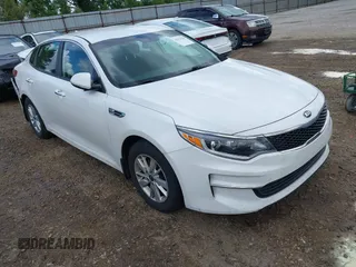 2018 Kia Optima LX z VIN KNAGT4L33J5232905, wystawiony jako IAAI lot #42333610 z przebiegiem 111 423 mil mil oraz . Historia ofert i sprzedaży dostępna na DreamBid. Obrazek 1.