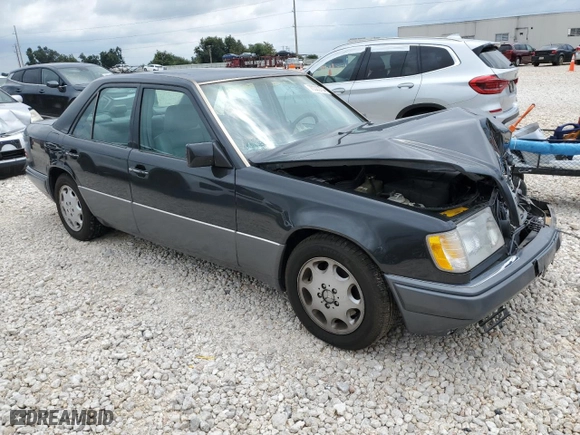 1994 Mercedes-Benz E Class with VIN WDBEA32EXRC074761, listed as a Copart auction lot 70322754 with 0 mi miles and Salvage Title. Bid and sale history available at carsss.com. Image 4.