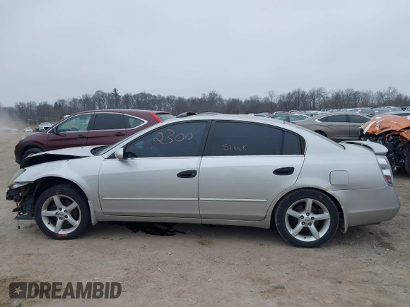 2005 Nissan Altima SE with VIN 1N4BL11E65C133566, listed as a IAAI auction lot 41792300 with 169,733 mi miles. Bid and sale history available at carsss.com. Image 14.