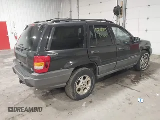 1999 Jeep Grand Cherokee Laredo with VIN 1J4GW58SXXC649579, listed as a IAAI auction lot 42365959 with 199,742 mi miles and . Bid and sale history available at DreamBid. Image 4.