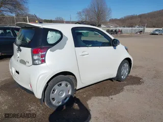 2012 Scion iQ with VIN JTNJJXB08CJ011734, listed as a IAAI auction lot 41769409 with 75,931 mi miles. Bid and sale history available at carsss.com. Image 4.