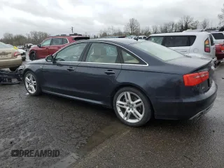 2015 Audi A6 3.0L TDI Prestige with VIN WAUHMAFC4FN029833, listed as a Copart auction lot 49511875 with 123,963 mi miles and Salvage Title. Bid and sale history available at carsss.com. Image 2.