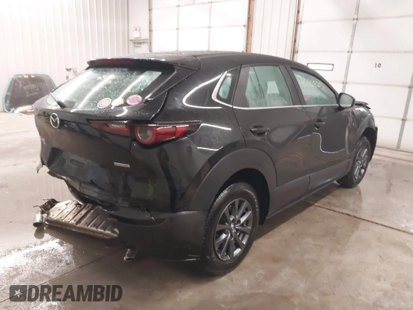 2021 Mazda CX-30 S with VIN 3MVDMBAL2MM265207, listed as a IAAI auction lot 41566325 with 62,587 mi miles and . Bid and sale history available at carsss.com. Image 4.