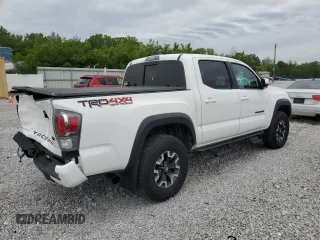 2023 Toyota Tacoma SR z VIN 3TMCZ5AN2PM583382, wystawiony jako Copart lot #58209775 z przebiegiem 17 442 mil mil oraz Szkoda całkowita • Salvage title. Historia ofert i sprzedaży dostępna na DreamBid. Obrazek 3.