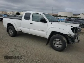 2014 Toyota Tacoma PreRunner with VIN 5TFTU4GN2EX063951, listed as a Copart auction lot 52083875 with 205,969 mi miles and Salvage title. Bid and sale history available at DreamBid. Image 4.