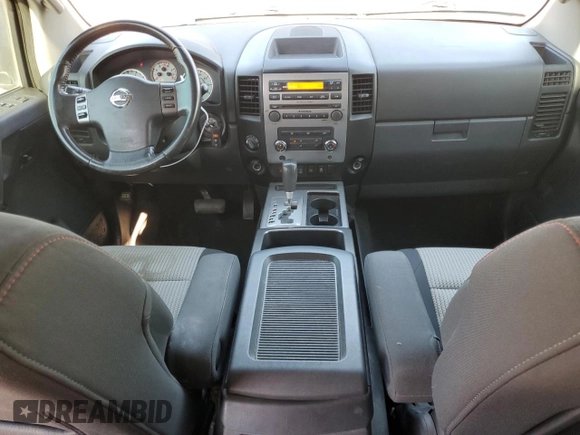 2012 Nissan Titan SV with VIN 1N6BA0EC6CN312465, listed as a Copart auction lot 58722815 with 186,207 mi miles and Salvage title. Bid and sale history available at DreamBid. Image 8.