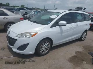 2012 Mazda 5 Sport with VIN JM1CW2BLXC0114770, listed as a IAAI auction lot 42147656 with 99,908 mi miles and . Bid and sale history available at DreamBid. Image 17.