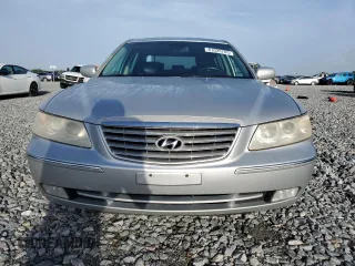 2006 Hyundai Azera SE with VIN KMHFC46F96A037972, listed as a Copart auction lot 61035765 with 140,857 mi miles and Salvage title. Bid and sale history available at DreamBid. Image 5.