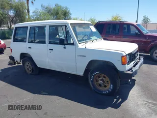 1990 Mitsubishi Montero z VIN JA4GJ31S0LJ009870, wystawiony jako IAAI lot #42192378 z przebiegiem 200 028 mil mil oraz . Historia ofert i sprzedaży dostępna na DreamBid. Obrazek 1.