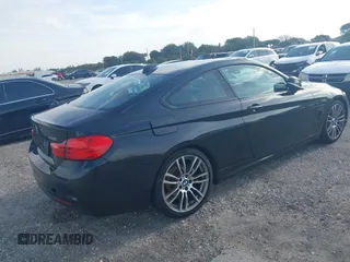 2015 BMW 4 Series 428i with VIN WBA3N3C56FK233866, listed as a IAAI auction lot 41983330 with 218,017 mi miles and . Bid and sale history available at DreamBid. Image 4.