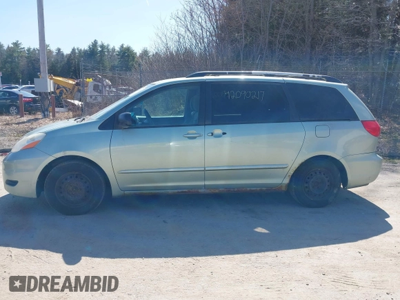 2009 Toyota Sienna CE with VIN 5TDZK23C29S233245, listed as a IAAI auction lot 42090217 with 340,012 mi miles. Bid and sale history available at carsss.com. Image 12.