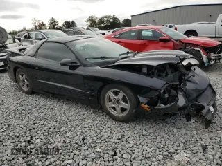 2002 Pontiac Firebird Formula z VIN 2G2FV22G822114416, wystawiony jako Copart lot #80131354 z przebiegiem 130 097 mil mil oraz Szkoda całkowita • Salvage title. Historia ofert i sprzedaży dostępna na DreamBid. Obrazek 4.