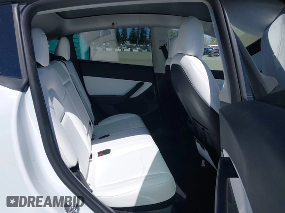 2022 Tesla Model Y Long Range z VIN 7SAYGDEE7NF418223, wystawiony jako IAAI lot #42046651 z przebiegiem 18 724 mil mil oraz . Historia ofert i sprzedaży dostępna na DreamBid. Obrazek 8.
