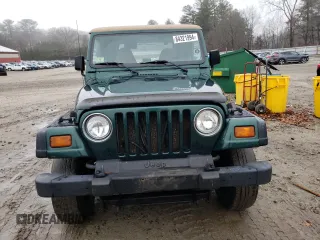 1999 Jeep Wrangler Sport with VIN 1J4FY19S2XP446059, listed as a Copart auction lot 84321994 with 183,068 mi miles and Clean Title. Bid and sale history available at carsss.com. Image 5.