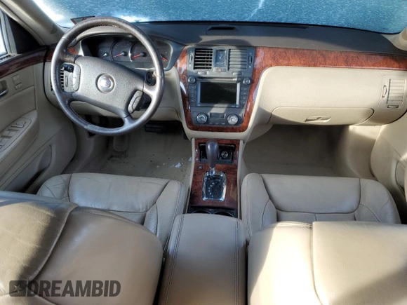 2007 Cadillac DTS Luxury I z VIN 1G6KD57Y57U223002, wystawiony jako Copart lot #87247984 z przebiegiem Nie podano mil oraz Szkoda całkowita • Salvage title. Historia ofert i sprzedaży dostępna na DreamBid. Obrazek 8.