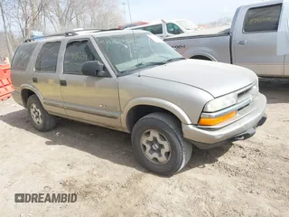 2004 Chevrolet Blazer LS z VIN 1GNDT13X04K164924, wystawiony jako IAAI lot #41803471 z przebiegiem 166 708 mil mil oraz . Historia ofert i sprzedaży dostępna na DreamBid. Obrazek 1.