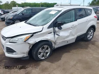 2016 Ford Escape SE z VIN 1FMCU9GX3GUB85250, wystawiony jako IAAI lot #42322056 z przebiegiem 187 833 mil mil oraz . Historia ofert i sprzedaży dostępna na DreamBid. Obrazek 6.