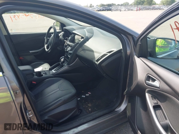 2014 Ford Focus Titanium with VIN 1FADP3N26EL453107, listed as a IAAI auction lot 42745891 with 148,743 mi miles and . Bid and sale history available at DreamBid. Image 5.
