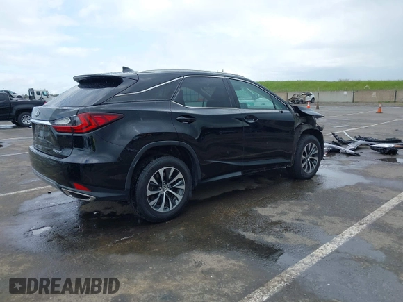 2021 Lexus RX with VIN 2T2HZMDA0MC274146, listed as a IAAI auction lot 41925284 with 67,064 mi miles. Bid and sale history available at carsss.com. Image 4.