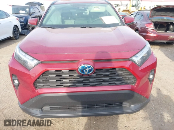 2023 Toyota RAV4 Hybrid XLE Premium z VIN JTMB6RFV8PD114927, wystawiony jako IAAI lot #41844127 z przebiegiem 14 582 mil mil oraz . Historia ofert i sprzedaży dostępna na DreamBid. Obrazek 12.