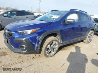 2024 Subaru Crosstrek Premium with VIN JF2GUADC1R8270383, listed as a IAAI auction lot 41578228 with 33,209 mi miles. Bid and sale history available at carsss.com. Image 2.