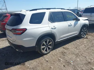 2023 Honda Pilot Elite with VIN 5FNYG1H81PB037228, listed as a IAAI auction lot 41742075 with 23,658 mi miles. Bid and sale history available at carsss.com. Image 4.