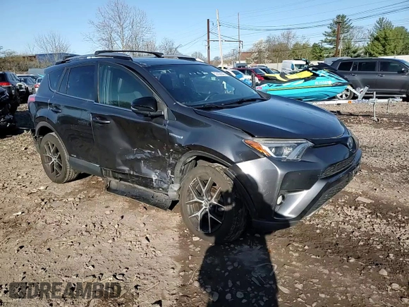 2018 Toyota RAV4 Hybrid SE with VIN JTMJJREV5JD210274, listed as a Copart auction lot 52450645 with 108,249 mi miles and Salvage title. Bid and sale history available at DreamBid. Image 12.