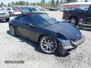 2014 Porsche 911 Carrera z VIN WP0CA2A94ES140857, wystawiony jako IAAI lot #42159010 z przebiegiem 46 230 mil mil oraz . Historia ofert i sprzedaży dostępna na DreamBid. Obrazek 1.