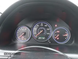 2005 Honda Civic VP z VIN 1HGEM21125L077764, wystawiony jako IAAI lot #41679934 z przebiegiem 204 142 mil mil oraz . Historia ofert i sprzedaży dostępna na DreamBid. Obrazek 7.