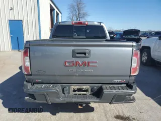 2021 GMC Canyon 4WD AT4 w/Leather with VIN 1GTG6FEN3M1180062, listed as a Copart auction lot 48116395 with 73,933 mi miles and Salvage Title. Bid and sale history available at carsss.com. Image 6.