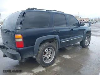 2001 Chevrolet Tahoe LS with VIN 1GNEK13T11R167502, listed as a IAAI auction lot 41798564 with 229,633 mi miles. Bid and sale history available at carsss.com. Image 4.