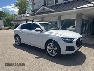 2019 Audi Q8 Premium Plus z VIN WA1BVAF15KD028897, wystawiony jako IAAI lot #42362513 z przebiegiem 108 105 mil mil oraz . Historia ofert i sprzedaży dostępna na DreamBid. Obrazek 1.
