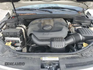 2011 Jeep Grand Cherokee Laredo with VIN 1J4RR4GG2BC581987, listed as a Copart auction lot 64072515 with 213,607 mi miles and Clean title. Bid and sale history available at DreamBid. Image 12.