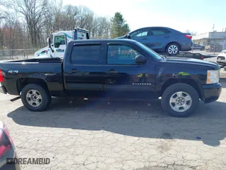 2011 Chevrolet Silverado 1500 LS with VIN 3GCPKREA4BG353984, listed as a IAAI auction lot 42094148 with 218,766 mi miles. Bid and sale history available at carsss.com. Image 13.