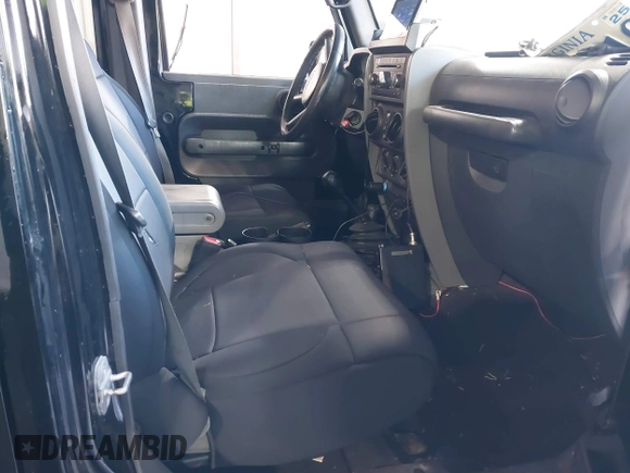 2008 Jeep Wrangler Unlimited Rubicon with VIN 1J8GA69108L562705, listed as a IAAI auction lot 41306923 with 150,002 mi miles and . Bid and sale history available at DreamBid. Image 5.