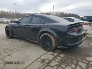 2021 Dodge Charger Scat Pack with VIN 2C3CDXGJ7MH584590, listed as a Copart auction lot 46396325 with 51,257 mi miles and Salvage Title. Bid and sale history available at DreamBid. Image 2.