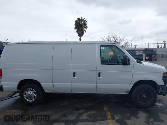 2014 Ford Econoline Cargo Commercial with VIN 1FTNE1EWXEDA18404, listed as a IAAI auction lot 42173934 with 188,301 mi miles and . Bid and sale history available at DreamBid. Image 13.
