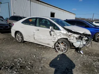 2010 Lexus HS 250h with VIN JTHBB1BA8A2019818, listed as a Copart auction lot 82401384 with 115,184 mi miles and Salvage Title. Bid and sale history available at DreamBid. Image 4.