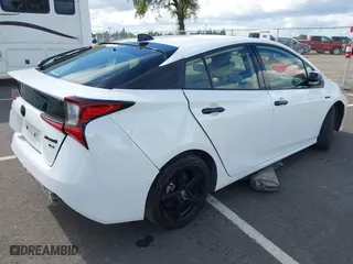 2022 Toyota Prius L Eco with VIN JTDKAMFU5N3174854, listed as a IAAI auction lot 41816230 with 93,444 mi miles. Bid and sale history available at carsss.com. Image 4.