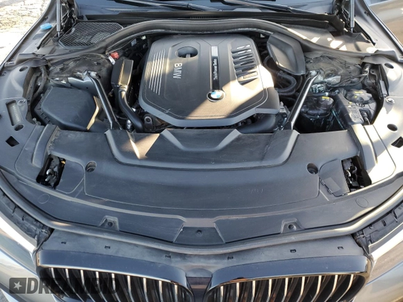 2017 BMW 7 Series 740i with VIN WBA7E2C32HG740988, listed as a Copart auction lot 49613465 with 63,646 mi miles and Salvage Title. Bid and sale history available at carsss.com. Image 12.