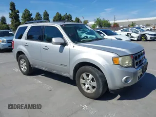 2009 Ford Escape Hybrid z VIN 1FMCU49379KA87852, wystawiony jako IAAI lot #42159280 z przebiegiem 155 054 mil mil oraz . Historia ofert i sprzedaży dostępna na DreamBid. Obrazek 1.