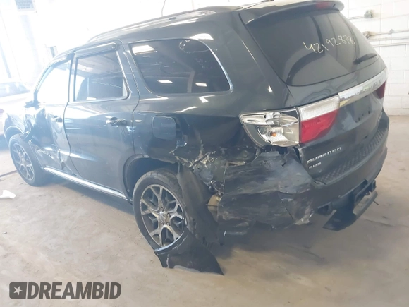 2013 Dodge Durango Citadel with VIN 1C4SDJET2DC529573, listed as a IAAI auction lot 42192878 with 217,445 mi miles and . Bid and sale history available at DreamBid. Image 6.