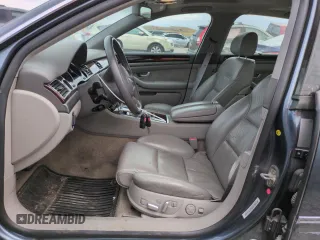 2004 Audi A8 with VIN WAUML44E04N021359, listed as a Copart auction lot 63251205 with 68,626 mi miles and Salvage title. Bid and sale history available at DreamBid. Image 7.