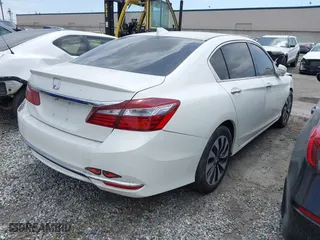 2017 Honda Accord Hybrid with VIN JHMCR6F36HC008930, listed as a IAAI auction lot 41601414 with 159,359 mi miles. Bid and sale history available at carsss.com. Image 4.