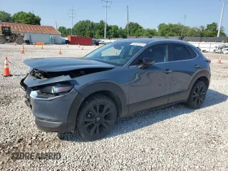 2023 Mazda CX-30 S Preferred z VIN 3MVDMBCMXPM561795, wystawiony jako Copart lot #60297525 z przebiegiem 42 212 mil mil oraz Szkoda całkowita • Salvage title. Historia ofert i sprzedaży dostępna na DreamBid. Obrazek 1.