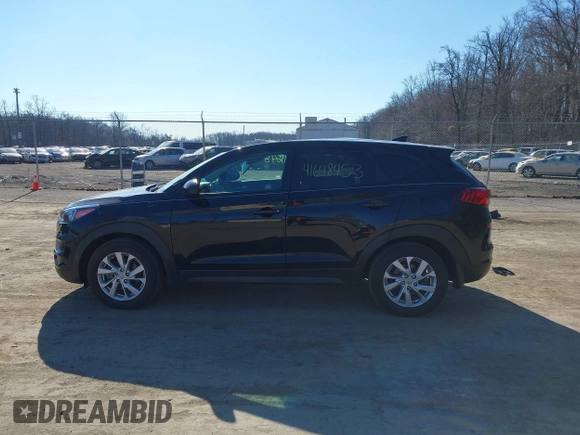2019 Hyundai Tucson SE with VIN KM8J2CA46KU073107, listed as a IAAI auction lot 41648453 with 58,417 mi miles. Bid and sale history available at carsss.com. Image 14.
