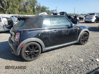 2011 MINI Convertible with VIN WMWZN3C57BTZ89544, listed as a Copart auction lot 80065204 with Not provided miles and Salvage title. Bid and sale history available at DreamBid. Image 3.