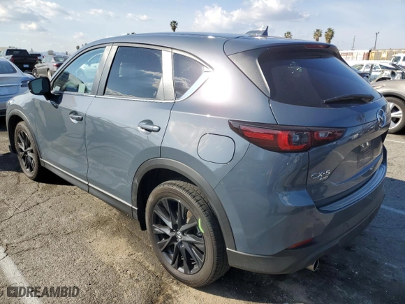 2024 Mazda CX-5 2.5 S Carbon Edition with VIN JM3KFBCM8R0350997, listed as a Copart auction lot 44432625 with 56,568 mi miles and Salvage Title. Bid and sale history available at carsss.com. Image 2.