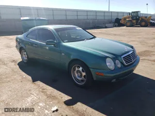 1999 Mercedes-Benz CLK-Class with VIN WDBLJ65G4XF071095, listed as a Copart auction lot 72080064 with 97,558 mi miles and Salvage Title. Bid and sale history available at carsss.com. Image 4.