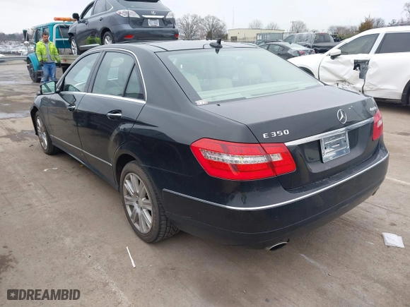 2013 Mercedes-Benz E-Class E 350 Luxury with VIN WDDHF8JB7DA708803, listed as a IAAI auction lot 41559901 with 101,097 mi miles. Bid and sale history available at carsss.com. Image 3.